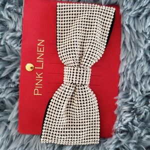 LARGE BLINGED BOW HAIR CLIP.